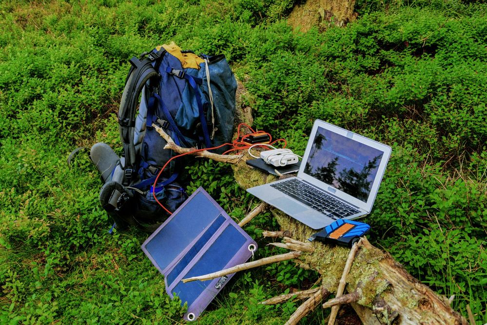 Large_MS PPT_Web-Solar powered laptop in field..jpg