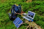 Large_MS PPT_Web-Solar powered laptop in field..jpg