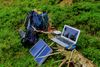 Large_MS PPT_Web-Solar powered laptop in field..jpg