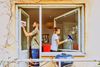 Large_MS PPT_Web-Man and woman cleaning the windows of a house..jpg