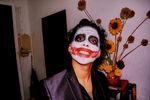 Large_MS PPT_Web-Close-up portrait of a man with face paint of the Joker.jpg